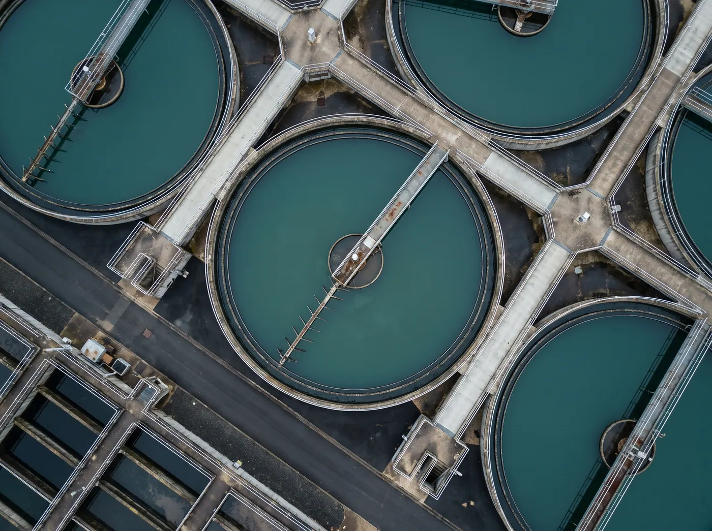 Aerial view of circular clarifier basins at a water treatment plant